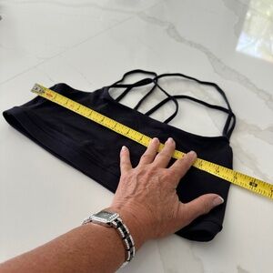 Black yoga sports bra size large across it measures 30